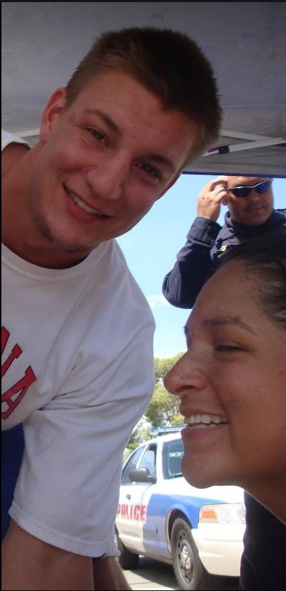 Grace Irene with Rob Gronkowski at the University of Arizona, smiling together during a memorable handcasting session.