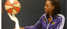 Amber AB Stocks — WNBA Champion with Custom Hand-Cast Keepsake by Keepsakes of Triumph Amber AB Stocks, WNBA Champion and former Chicago Sky General Manager, holding a custom basketball hand cast keepsake by Keepsakes of Triumph